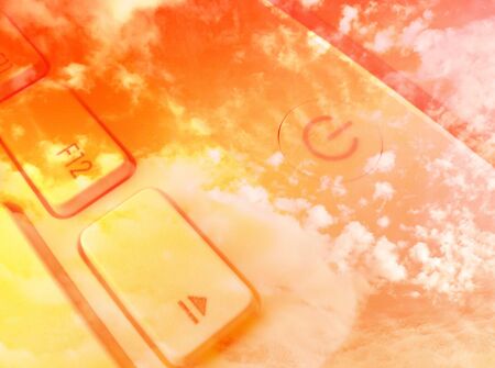 Coseup of laptop keys overlaid with red  cloud effectの写真素材