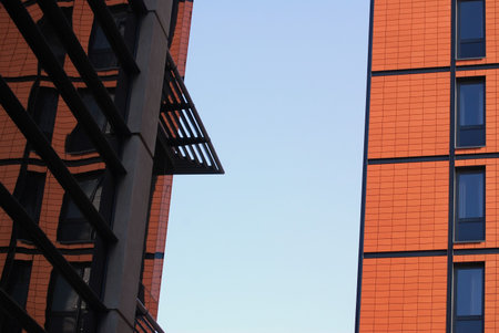 Tower blocks with one reflected in windows of other.の写真素材