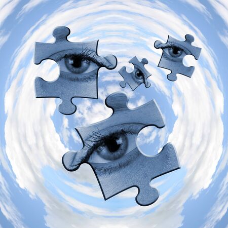 Abstract showing jigsaw piece eyes over circular skyの写真素材