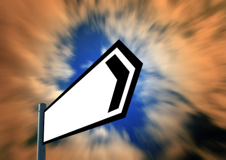 Blank signpost with puffy clouds in blue/orange sky