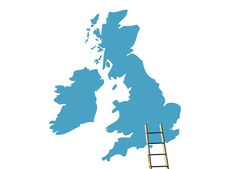 Builders ladder propped against UK map outlineの写真素材
