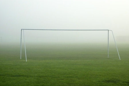 View of football goalpost in foggy weatherの写真素材