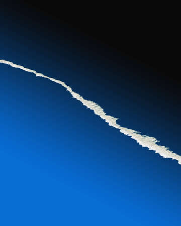 Scanned torn paper effect over blue backgroundの写真素材