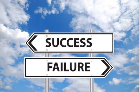 Success or failure sign in front of cloudy blue skyの写真素材