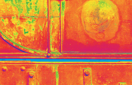 Side of old railway carriage with over saturated colors for effect.