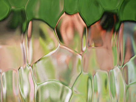Distorted shapes taken through patterned glassの写真素材