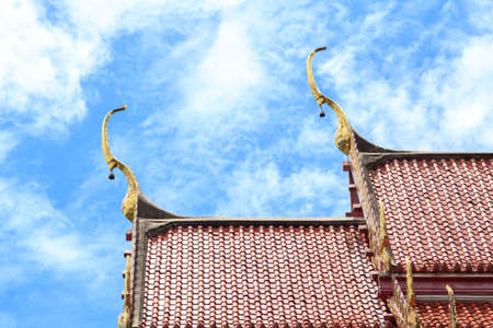 Thai temple roof and sky blue and white.の写真素材