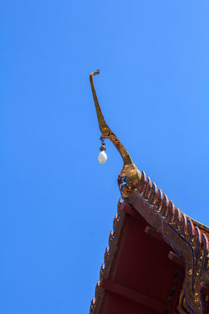Thai temple roof and sky blue and white.
