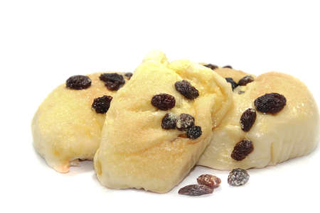Butter bread with raisins straight from the oven on a white background.の写真素材