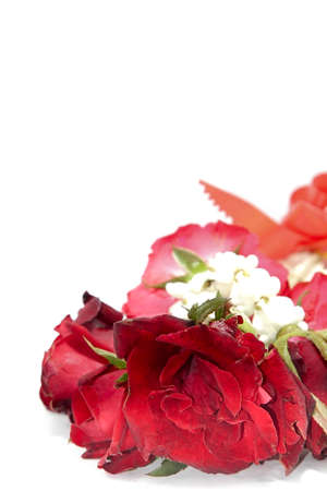 Fresh flower garlands made from red rose and jasmine flowers for use in ceremonies in Thailand such as Buddhist rituals and auspicious events.の写真素材