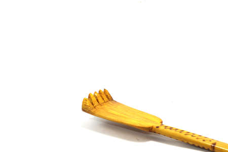 scratching stick made from eco-friendly natural materials helps take care of the body and the itch.の写真素材