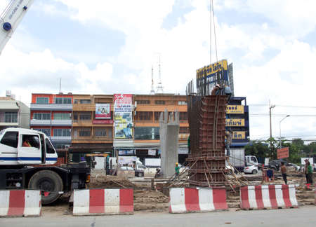 The construction of bridge columns where people are working, concrete cement, strong ground structures - Nakhon Pathom Thailand -10-8-2014のeditorial素材
