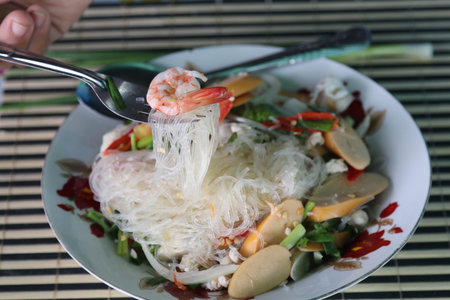 Spicy Vermicelli Salad Ready to Serve on Plates - Spicy Taste is a healthy food, a traditional Thai...