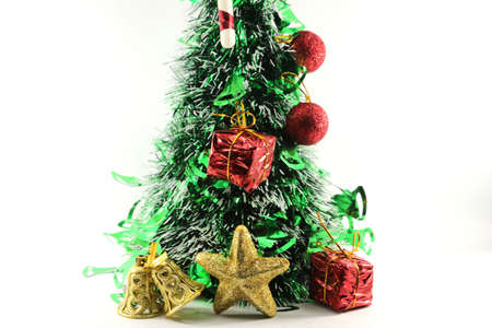 Christmas elements Christmas gift pine branches toy on a white background Laid flat, the top view is a festival celebrated by people all over the world.の写真素材