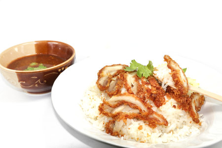 fried chicken rice set, a popular Thai dish - dipping sauce + broth - is a healthy fast food, available on the streets and at major food courts around the country, slightly spicy and delicious.の写真素材