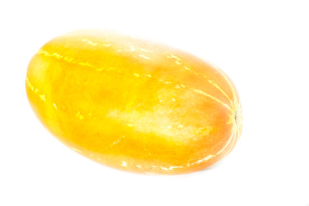 Thai cantaloupe, Asian tropical fruit. Yellow melon or Korean cantaloupe On a white background, the...