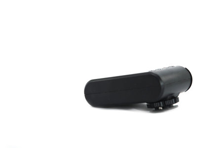 small flash-manual camera on a white background is an accessory for beginner photographers looking...