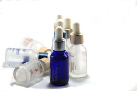anti-aging facial serum is a natural and pure extracted elder lotion in a small glass bottle on a separate white background, popular with young people these days.8-8-2010-Nakhon Pathom Thailandの写真素材