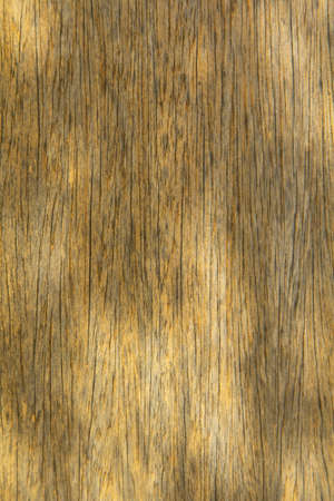 pattern of the old wooden plank is yellow hardwood, natural wood used to decorate the house to be beautiful and protect against robbers and criminals.の写真素材