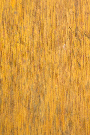 pattern of the old wooden plank is yellow hardwood, natural wood used to decorate the house to be beautiful and protect against robbers and criminals.の写真素材