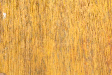 pattern of the old wooden plank is yellow hardwood, natural wood used to decorate the house to be beautiful and protect against robbers and criminals.の写真素材