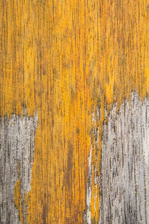 pattern of the old wooden plank is yellow hardwood, natural wood used to decorate the house to be beautiful and protect against robbers and criminals.の写真素材