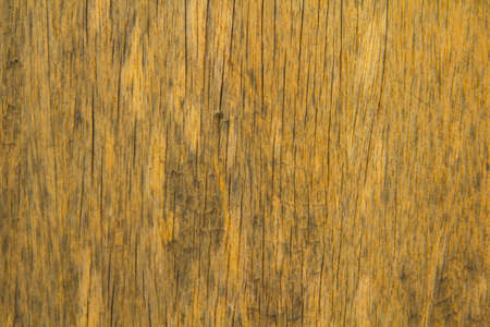 pattern of the old wooden plank is yellow hardwood, natural wood used to decorate the house to be beautiful and protect against robbers and criminals.の写真素材