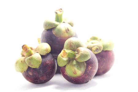 Mangosteen is the queen of Thai fruits. It is a seasonal fruit, popularly consumed and consumed as organic, non-toxic fruit, exported throughout Asia and Europe on a white background.の写真素材