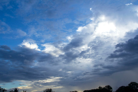 Many clouds - many colors before the sun goes down. The atmosphere was frightening as if the summer...