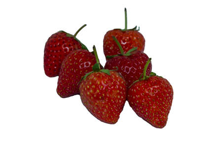 Delicious and ripe red strawberries are organic fruit on white background. Shot with flash and LED lights, images look sharp in my home studio on a separate white background.の写真素材
