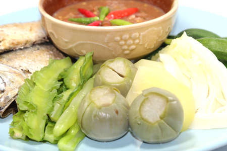 Shrimp paste and mackerel chili paste is a Thai food with sour and spicy taste. And sweet to eat with fresh vegetables and boiled vegetables is a healthy food that Thai people like to consume.の写真素材