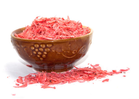 Red dried shrimp Is a food preservation Of Asian people on a white background. Use the flash for sharpness in the studio.の写真素材