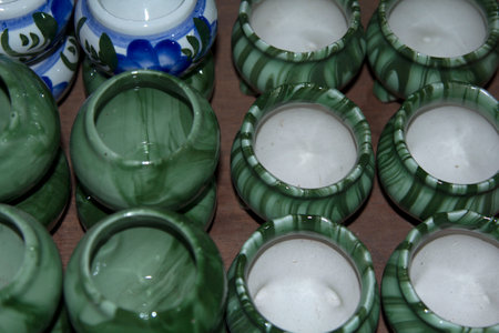 Pottery and ceramics that are modernly designed, such as dishes, mugs, small pots and many shapes, spheres, squares, as food containers. Coffee and others are sold at various shops and festivalsの写真素材