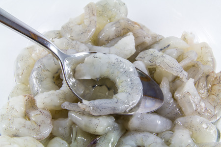 The shrimp was peeled scoop on a spoon.の写真素材