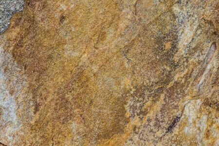 This is texture of Brown stone nearly beach. The color is brown.の写真素材