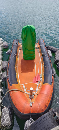 Fishing boat on the sea in a sunny day, close-up