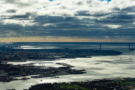 Aerial view of Manhattan skyline from the sky on a cloudy day, New York City.の写真素材