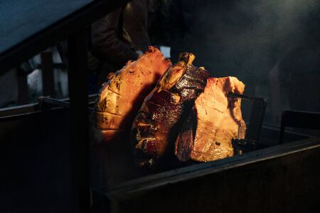 Typical Prague ham on the Christmas market at the Old Town square in Pragueの写真素材
