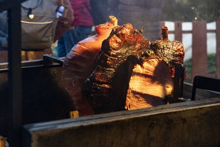 Typical Prague ham on the Christmas market at the Old Town square in Pragueの写真素材