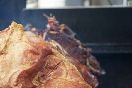 Typical Prague ham on the Christmas market at the Old Town square in Pragueの写真素材