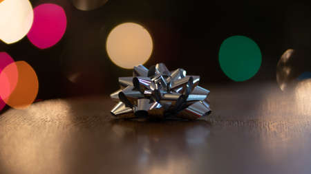 a silver decoration is on the tableの写真素材