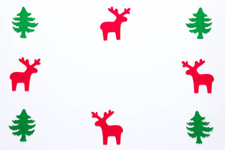 Christmas composition. Christmas tree, dear, Santa Claus on white background. Flat lay, top viewの写真素材