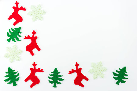 Christmas composition. Christmas tree, dear, Santa Claus on white background. Flat lay, top viewの写真素材