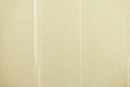 Paper texture light rough textured spotted blank copy space background in beige, yellow, brownの写真素材
