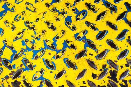 Diamond steel plate background, Rusted diamond steel plate yellow, old diamond steel plate texture, Yellow Blue Background of old metal diamond plate, rust steel plateの写真素材