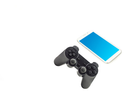 Gamepad Joystick and smart phone on white background