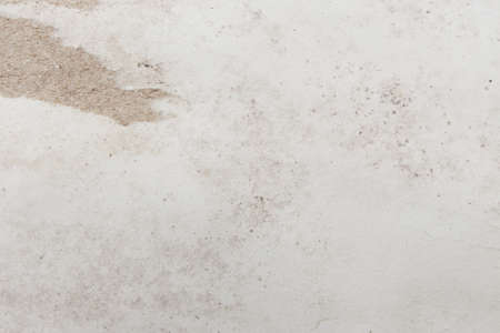 White beige paper background texture light rough textured spotted blank copy space backgroundの写真素材