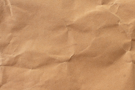 paper background texture light rough textured spotted blank copy space background in yellow,brownの写真素材