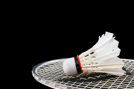 Shuttlecock and badminton on dark background の写真素材