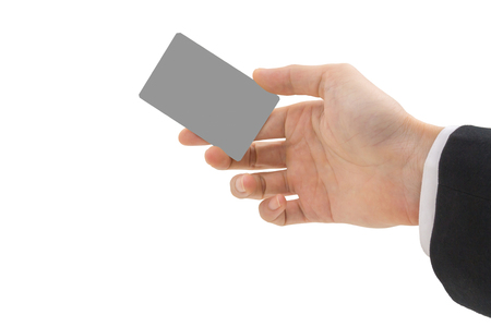 hand holding blank paper business card on white backgroundの写真素材